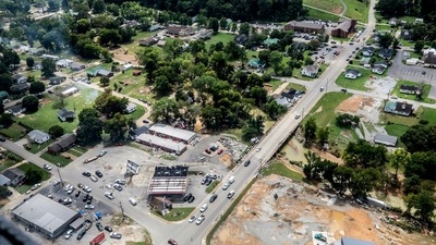 Flood damage is photographed from a Tennessee National Guard UH-60 Black Hawk helicopter flying Gov. Bill Lee to Waverly, Tenn. (AP) Flood damage is photographed from a Tennessee National Guard UH-60 Black Hawk helicopter flying Gov. Bill Lee to Waverly, Tenn. (AP)
