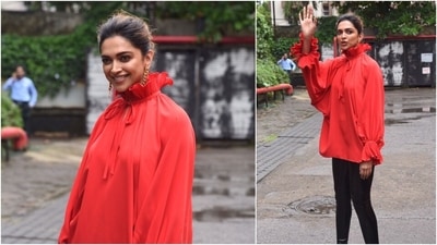 With her hair tied up in a messy bun, Deepika Padukone accessorised her classy look with golden statement earrings. (HT Photo/Varinder Chawla)
