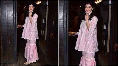 Shanaya teamed the kurti with matching sharara pants that carried similar white embroidery. The Gen-Z fashionista completed her look with a floral face mask and no accessories. (HT Photo/Varinder Chawla)