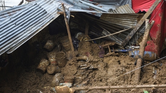 The backyard of a house is seen where a mudslide killed several people after Hurricane Grace pummeled Mexico with torrential rain on Saturday, August 21.(REUTERS)