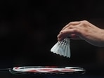 A match official places a new shuttlecock on a racket(Getty Images) A match official places a new shuttlecock on a racket(Getty Images)