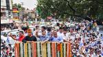 Dehradun: Delhi Chief Minister Arvind Kejriwal with Aam Aadmi Party's chief ministerial candidate for Uttarakhand elections, retired Col. Ajay Kothiyal during 'Devbhoomi Sankalp Yatra', in Dehradun, on Aug 17, 2021. (PTI)