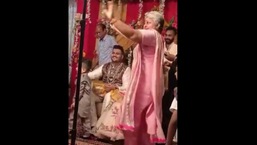 The image shows Monika Sharma dancing. The image shows Monika Sharma dancing.