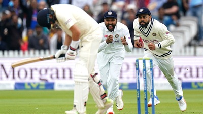 Virat Kohli celebrates catching the ball to dismiss England captain Joe Root on day five of the Second Test match at Lord's (AP) Virat Kohli celebrates catching the ball to dismiss England captain Joe Root on day five of the Second Test match at Lord's (AP)