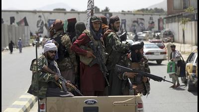 Taliban fighters patrol streets of Kabul, Afghanistan, on August 19. (AP)