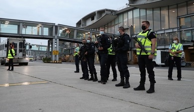 Police officers stand guard as a plane carrying people who have been evacuated from Afghanistan arrive at Roissy Charles-de-Gaulle airport after Taliban insurgents entered Afghanistan's capital Kabul, near Paris, France. (REUTERS) Police officers stand guard as a plane carrying people who have been evacuated from Afghanistan arrive at Roissy Charles-de-Gaulle airport after Taliban insurgents entered Afghanistan's capital Kabul, near Paris, France. (REUTERS)