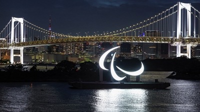 Illuminated Paralympic symbol is seen at the waterfront area of Odaiba Marine Park, ahead of the opening ceremony of the Tokyo 2020 Paralympic Games, in Tokyo, Japan (REUTERS)