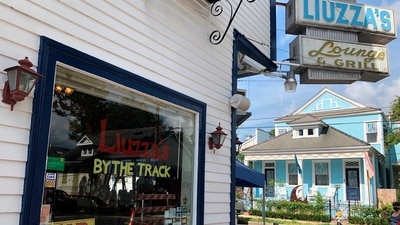 Owners and workers at Liuzza’s say tourists make up a large share of their business at Jazz Fest time but the festival was cancelled in 2020 due to the Covid-19 pandemic. It was postponed this year, then cancelled again, as area hospital populations swell with new patients in a surge fuelled by the delta variant of the virus and the state’s low vaccination rate. (AP Photo/Kevin McGill) Owners and workers at Liuzza’s say tourists make up a large share of their business at Jazz Fest time but the festival was cancelled in 2020 due to the Covid-19 pandemic. It was postponed this year, then cancelled again, as area hospital populations swell with new patients in a surge fuelled by the delta variant of the virus and the state’s low vaccination rate. (AP Photo/Kevin McGill)
