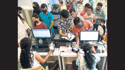 People register to receive a dose of the Covaxin vaccine against the Covid-19 coronavirus at Dr. Antonio Da Silva High School in Mumbai on August 17. (AFP) People register to receive a dose of the Covaxin vaccine against the Covid-19 coronavirus at Dr. Antonio Da Silva High School in Mumbai on August 17. (AFP)
