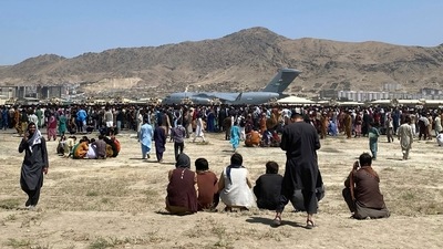 Panicked Afghans and foreigners have thronged the Kabul airport for days, clamoring to catch a flight out before the US-led forces complete their pullout by the end of the month. Panicked Afghans and foreigners have thronged the Kabul airport for days, clamoring to catch a flight out before the US-led forces complete their pullout by the end of the month.