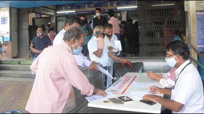Fully vaccinated commuters get their vaccination certificates verified at Borivli railway station. (VIJAY BATE/HT PHOTO)