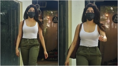 Janhvi wore the top with olive green coloured pants that came with gathered hemline and pocket details on the front. The pants hugged Janhvi's figure perfectly and accentuated her curves. (HT Photo/Varinder Chawla)