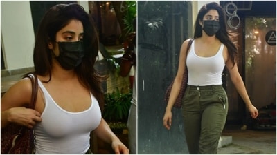 Janhvi wore a sleeveless white bodysuit for the outing. It featured a scooped neckline and a body-hugging silhouette. (HT Photo/Varinder Chawla) Janhvi wore a sleeveless white bodysuit for the outing. It featured a scooped neckline and a body-hugging silhouette. (HT Photo/Varinder Chawla)