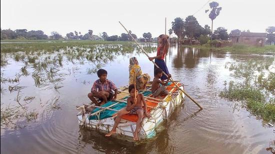 16 districts in Bihar are affected due to floods, making movement difficult among other challenges faced by the people. (PTI)