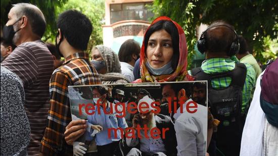 Afghan nationals living in Delhi seen during a protest outside the UNHCR office (United Nations High Commissioner for Refugees). Hundreds of Afghans living in India gathered to demand the granting of refugee status in India, in New Delhi.