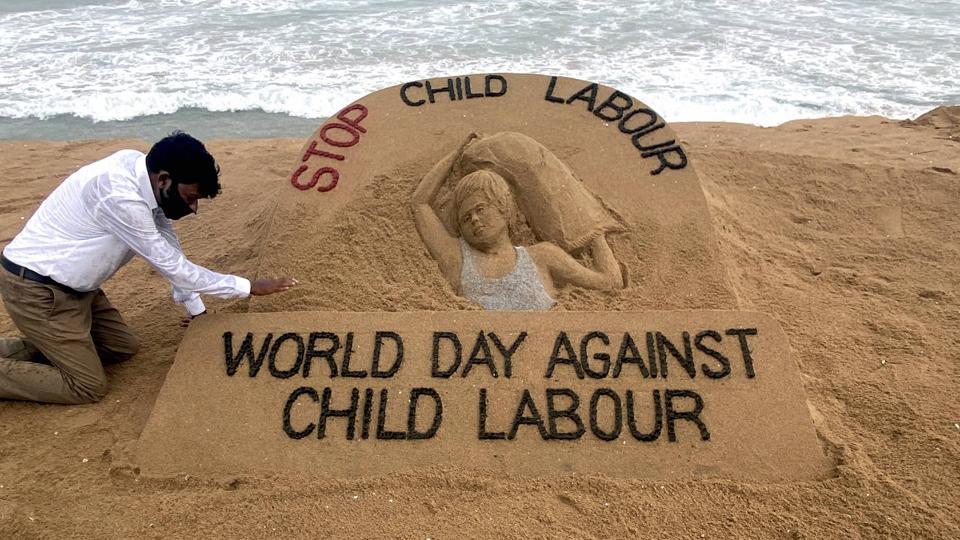 Puri: Artist Sudarsan Patnaik gives finishing touches to a sand sculpture with a message, Stop Child Labour, ahead of World Day against Child Labour, in Puri, Thursday, June 11, 2020. (PTI Photo)(PTI11-06-2020_000162A) (PTI) Puri: Artist Sudarsan Patnaik gives finishing touches to a sand sculpture with a message, Stop Child Labour, ahead of World Day against Child Labour, in Puri, Thursday, June 11, 2020. (PTI Photo)(PTI11-06-2020_000162A) (PTI)