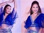 Madhuri Dixit teams the most dramatic blouse with embellished lehenga, Nora Fatehi reacts(Instagram/@madhuridixitnene) Madhuri Dixit teams the most dramatic blouse with embellished lehenga, Nora Fatehi reacts(Instagram/@madhuridixitnene)