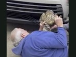 The image shows the owl being rescued.