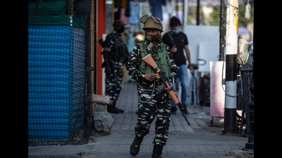 Paramilitary soldiers patrolling a street in Srinagar on Tuesday. (AP)