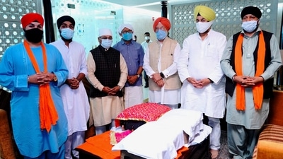 Union ministers Hardeep Singh Puri and V Muraleedharan and BJP leader Sardar RP Singh receive the copies of Guru Granth Sahib brought from Kabul. (PTI Photo) Union ministers Hardeep Singh Puri and V Muraleedharan and BJP leader Sardar RP Singh receive the copies of Guru Granth Sahib brought from Kabul. (PTI Photo)