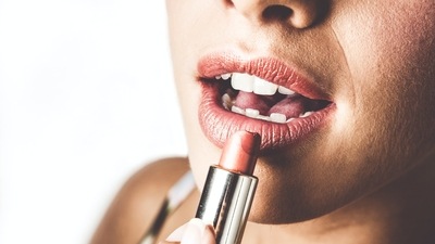 Go for waterproof lipstick that will not just last the entire day but also prevent it from smudging. (Unsplash)
