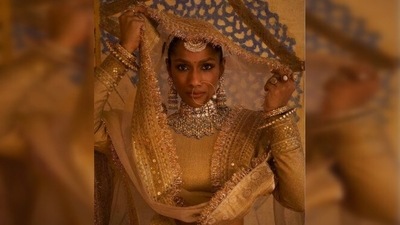 In the pictures, shared on Sabyasachi's Instagram page, Masaba Gupta can be seen posing with minimal makeup and heavy jewellery. (Instagram/@sabyasachiofficial) In the pictures, shared on Sabyasachi's Instagram page, Masaba Gupta can be seen posing with minimal makeup and heavy jewellery. (Instagram/@sabyasachiofficial)