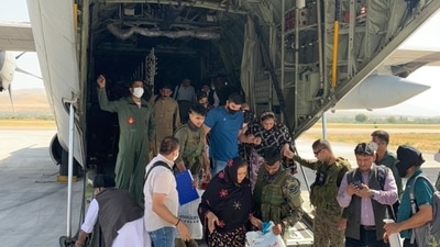 The 78 passengers evacuated from Afghanistan by India on at Delhi airport. (Twitter/@MEAIndia) The 78 passengers evacuated from Afghanistan by India on at Delhi airport. (Twitter/@MEAIndia)