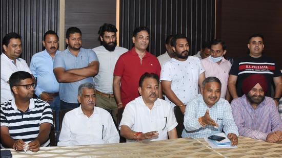 Members of Ludhiana Hotmix Plant Welfare Association addressing the media in Ludhiana on Tuesday. (Gurpreet Singh/HT) Members of Ludhiana Hotmix Plant Welfare Association addressing the media in Ludhiana on Tuesday. (Gurpreet Singh/HT)