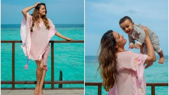 Anita Hassanandani poses against the blue ocean with son Aaravv in the Maldives.