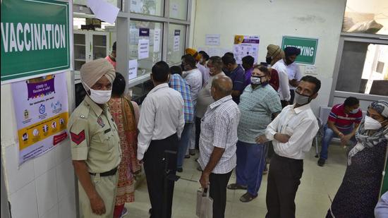 A queue outside the vaccination counter at the civil surgeon office in Ludhiana in April. (Gurpreet Singh/HT File Photo)
