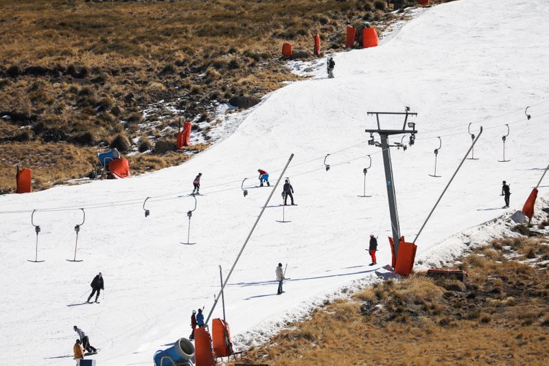 People ski at Kapoko Snow Park at Afriski Mountain Resort in Butha Buthe, Lesotho (Reuters)