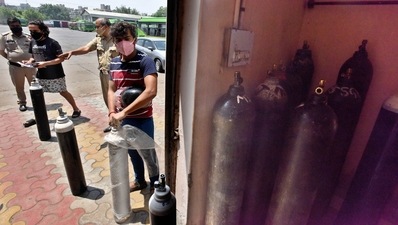 People queue with empty oxygen cylinders to be replaced at Hasanpur Depot, in New Delhi during the second wave in May. (Raj K Raj / Hindustan Times) People queue with empty oxygen cylinders to be replaced at Hasanpur Depot, in New Delhi during the second wave in May. (Raj K Raj / Hindustan Times)