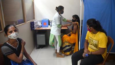 Beneficiaries in the above-18 age group get inoculated against Covid-19 at a vaccination centre in Vile Parle (East), Mumbai, India on Wednesday. (HT PHOTO)