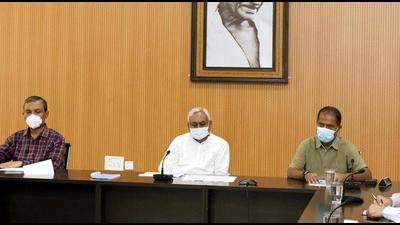Chief Minister Nitish Kumar holds meeting of crisis management croup through video conferencing in Patna on Wednesday. (Santosh Kumar/ HT Photo) Chief Minister Nitish Kumar holds meeting of crisis management croup through video conferencing in Patna on Wednesday. (Santosh Kumar/ HT Photo)
