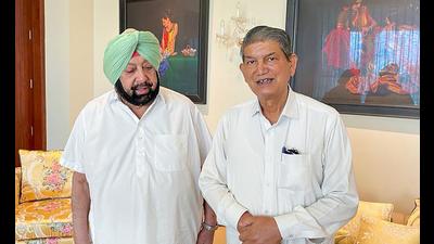Punjab chief minister Capt Amarinder Singh with AICC general secretary and in-charge of party’s affairs in the state Harish Rawat (PTI FILE) Punjab chief minister Capt Amarinder Singh with AICC general secretary and in-charge of party’s affairs in the state Harish Rawat (PTI FILE)