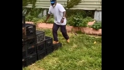 The image shows an individual trying the Milk Crate challenge. (Screengrab) The image shows an individual trying the Milk Crate challenge. (Screengrab)