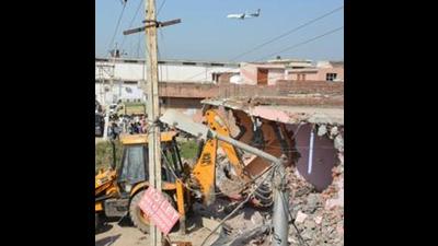 In July, demolition drives were carried out in Johluwal and Marranwala villages and Pinjore-Nalagarh on NH-21A, wherein three buildings were demolished, and four shops were sealed. (HT file)