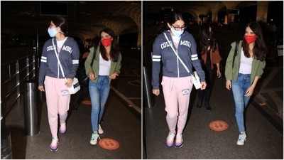 Sara chose a Columbia jersey jacket for her airport look. She teamed it with a comfy printed top, blush pink joggers, an over-the-body patterned bag and chunky lace-up sneakers. (HT Photo/Varinder Chawla)