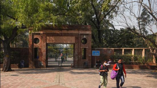 Students outside the University Plaza after Delhi University reopened for final year students on February 1, 2021. (Amal K S/ Hindustan Times)