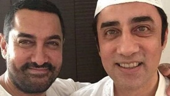 Aamir Khan poses with his brother, Faissal Khan.