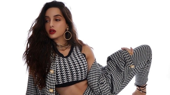 Nora Fatehi glams up her co-ord check crop top and pants set with bold red lips, see pics(Instagram/@norafatehi)