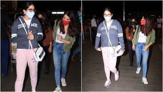 Radhika Madan kept it classy and comfy in a solid white top, figure-hugging denims and an olive green jacket. She teamed the classic combination with chunky sneakers and a red face mask.(HT Photo/Varinder Chawla)