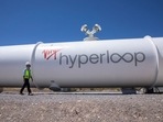 Josh Giegel, co-founder and CEO of Virgin Hyperloop, walks next to a hyperloop tube at the company's hyperloop facility near Las Vegas, Nevada.(Reuters / File)