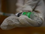 A medical staff prepares a jab of the Covishield, AstraZeneca-Oxford's Covid-19 coronavirus vaccine (AFP). A medical staff prepares a jab of the Covishield, AstraZeneca-Oxford's Covid-19 coronavirus vaccine (AFP).