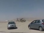 Grab from the video which shows a Blackhawk helicopter being driven at the Kandahar airport. 