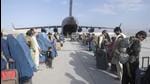 US Air Force loadmasters and pilots assigned to the 816th Expeditionary Airlift Squadron load people being evacuated from Afghanistan onto a US Air Force C-17 Globemaster III at Hamid Karzai International Airport in Kabul, Afghanistan. (AP) US Air Force loadmasters and pilots assigned to the 816th Expeditionary Airlift Squadron load people being evacuated from Afghanistan onto a US Air Force C-17 Globemaster III at Hamid Karzai International Airport in Kabul, Afghanistan. (AP)