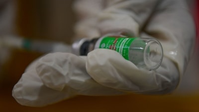 A medical staff prepares a jab of the Covishield, AstraZeneca-Oxford's Covid-19 coronavirus vaccine (AFP). A medical staff prepares a jab of the Covishield, AstraZeneca-Oxford's Covid-19 coronavirus vaccine (AFP).