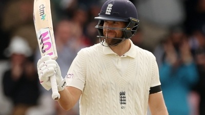 Cricket - Third Test - England v India - Headingley, Leeds, Britain - August 26, 2021 England's Dawid Malan celebrates reaching his half century Action Images via Reuters/Lee Smith (Action Images via Reuters)