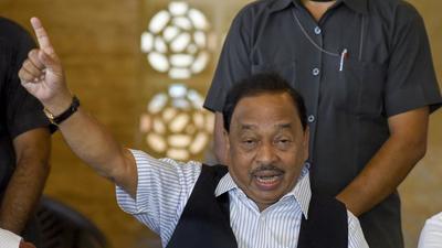 Union minister Narayan Rane addresses a press conference at his residence at Juhu in Mumbai on Wednesday. (PTI)