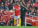 Arsenal's Pierre-Emerick Aubameyang with manager Mikel Arteta.